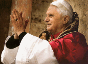 Pope Benedict XVI waves to the crowds after his election.